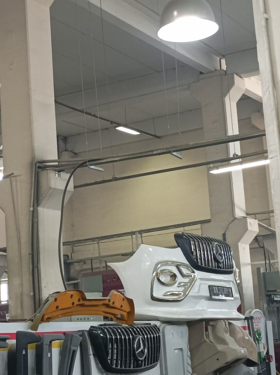 Finished Mercedes Sprinter front bumper and GT grilles in the MV Auto Parts assembly hall